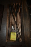 Three Pliers on a Wooden Plaque