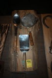 Three Culinary Tools on a Wooden Plaque