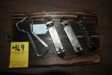 Four Bottle and Can Openers on a Wooden Plaque