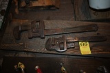 Two Pipe Wrenches on Wooden Plaque