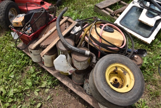 Pallet of paints, tires, and parts