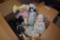 Box of Dolls and Knit Table Clothes