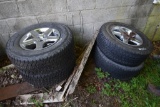 4 Goodyear Wrangle P265/70R17 Tires on 5 Lug Rims