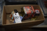 Fred Flintstone and 2 Texaco Tins