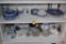 Two shelves of Blue and White China with some Glass Ware