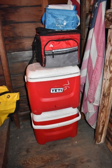 Two Smaller Red Coolers and 2 Cloth Coolers