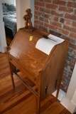 Stationary Desk with Wooden Farmer Sculpture