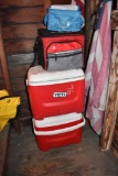 Two Smaller Red Coolers and 2 Cloth Coolers