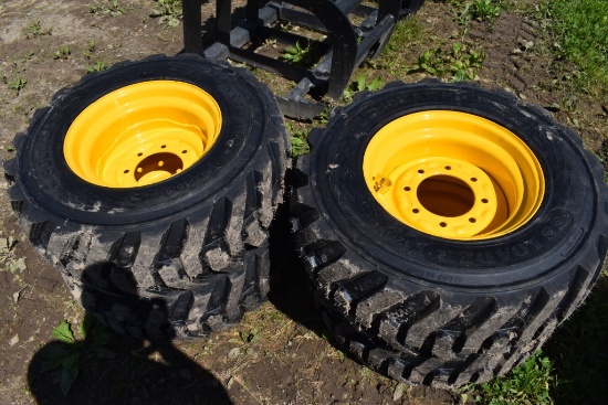 4 Solidmax HD 12-16.5 Tires on 6 Lug Rims