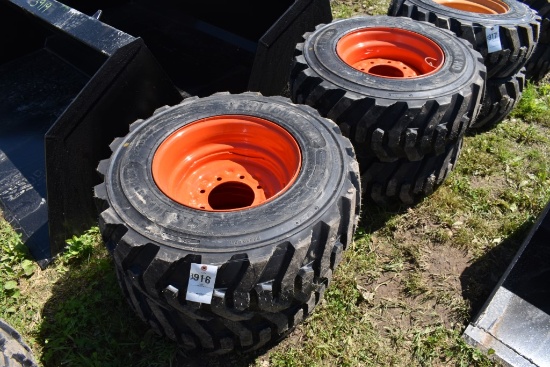 4 Solidmax HD 12-16.5 Tires on 6 Lug Rims