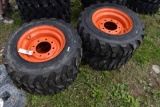 4 Forerunner 10-16.5NHS Tires on 8 Lug Rims