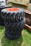 4 Solidmax 12-16.5 Tires on 8 Lug Rims