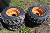 4 Solidmax HD 12-16.5 Tires on 6 Lug Rims