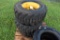 3 Titan 12-16.5 Skid Steer Tires on 8 Lug Rims