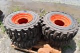 4 Bobcat 12-16.5 Skid Steer Tires on 8 Lug Rims