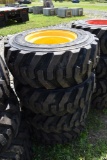 4 Solidmax HD 12-16.5 Skid Steer tires on 8 Lug Rims