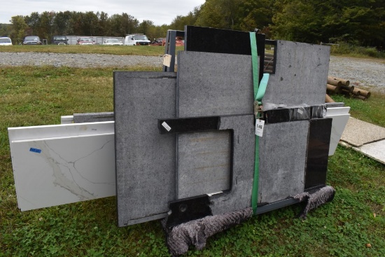 Group of Granite Slabs and Counters on Rack
