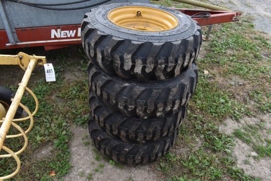 4 Forerunner 10-16.5 Skid Steer Tires on 8 Lug Rims