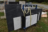 Group of Granite Slabs and Counters on Rack