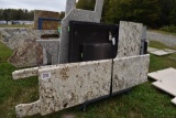 Group of Granite Slabs and Counters on Rack