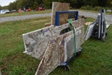 Group of Granite Slabs and Counters on Rack