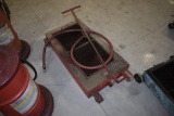 Under Truck Oil Pan on Wheels