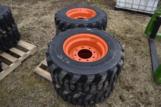 4 forerunner 12-16.5 Skid Steer Tires on 8 Lug Rims