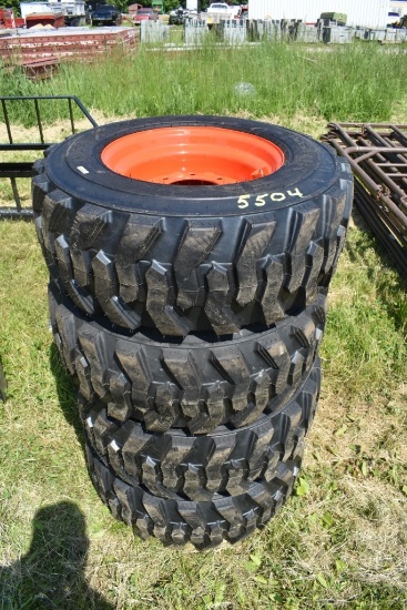 4 Forerunner 12-165 Skid Steer Tires on 8 Lug Rims