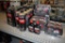 Large Group of Red Armor 2-Stroke Engine Oil Additive