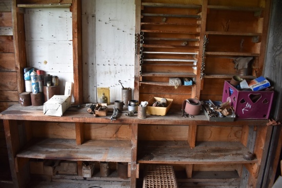 contents of Shelf including Wrenches, sockets, Cans, Sanding Papers