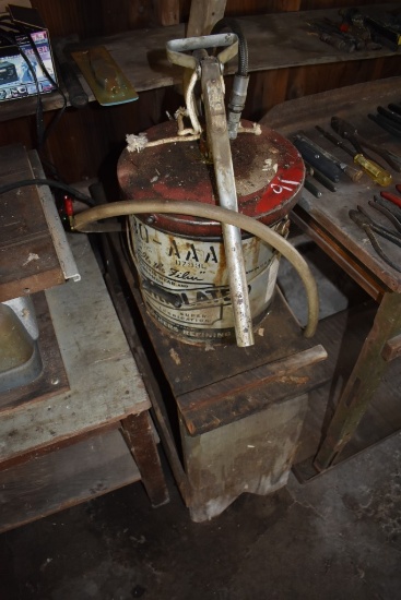 5 Gallon Pail with Pump on wooden Stand