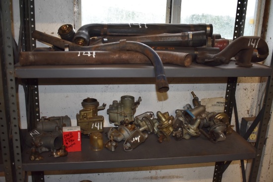 Two Shelves Of Gas Bulbs Carbonators Exhaust Parts And Gaskets