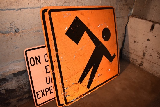 Three Construction Signs