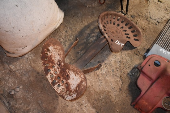 Two Vintage Tractor Seats