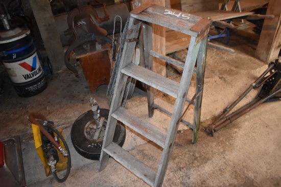 Three Step  Ladder And A Homemade Sprinkler