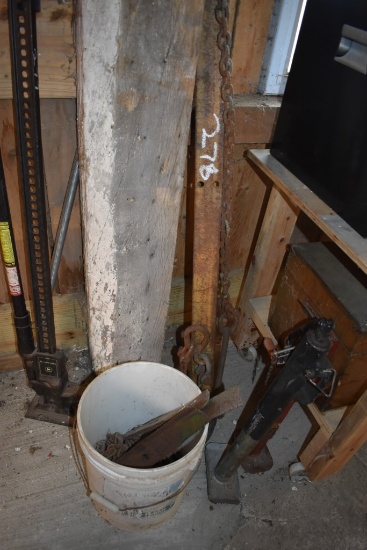 Material Life On Small Id With Bucket Of Chains And Mower Blades