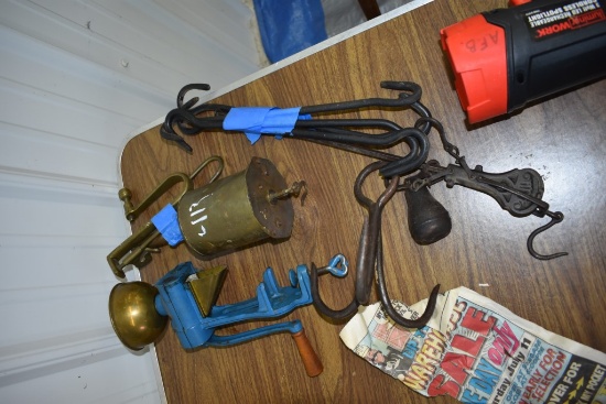 Two Scales, A Coffee Grinder, And A Meat Hook