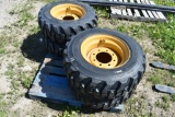 4 Forerunner 10-16.5 Skid Steer Tires on 8-Lug Rims