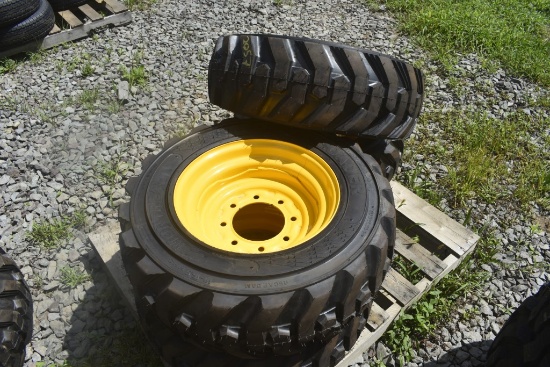 4 Montreal 10-16.5 Skid Steer Tires on 8 Lug Rims