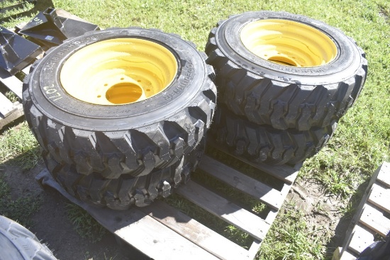 4 Forerunner 10-16.5 Skid Steer Tires on 8 Lug Rims