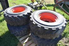 4 Galaxy 14-17.5 Skid Steer Tires on 8 Lug Rims