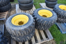 4 Forerunner 10-16.5 Skid Steer Tires on 8 Lug Rims