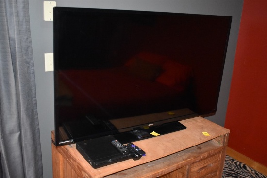 Sanyo 56" Flatscreen TV with DVD Player and Remotes
