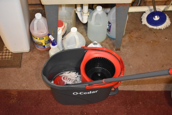 Group of Cleaning Supplies and Mop Bucket