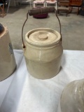 small stone crock with handle and lid