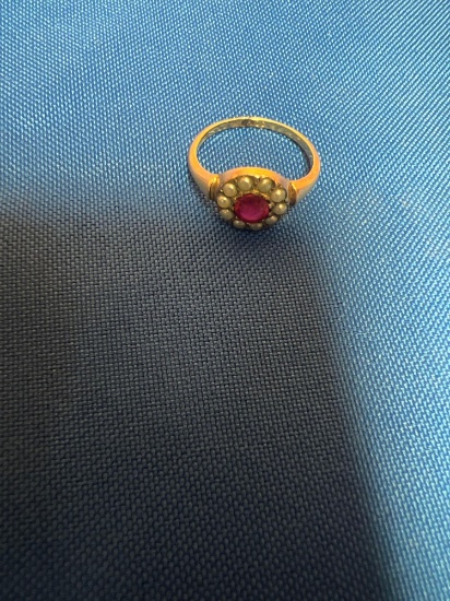 gold band ring with ruby w&co