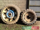 Rear Michelin wheels - 230/95 R48 Front Taurus rwo crop wheels - 9.5 R32 Both Ford / New Holland
