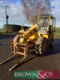 JCB 520-4 4wd telescopic materials handler with pallet tines. Registration No. OEW 744X. Hrs: