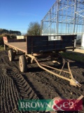 Flat bed trailer with dolly
