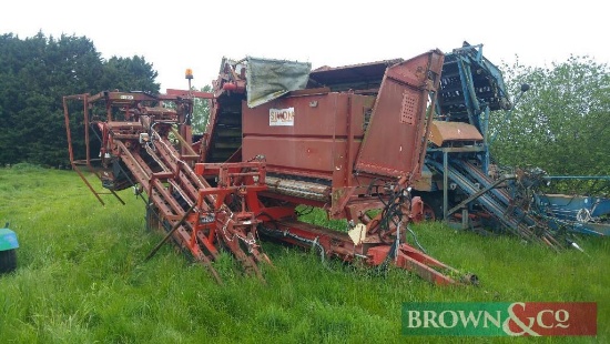 Simon top lifting harvester